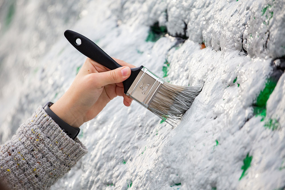 Detail of the rock being painted.